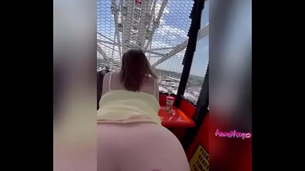 Slut get fucks in public on the Ferris wheel